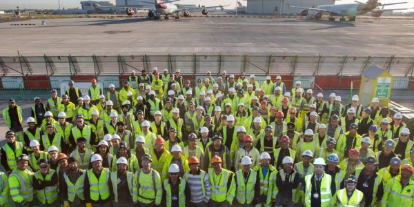 Large TAG workforce group photo on site