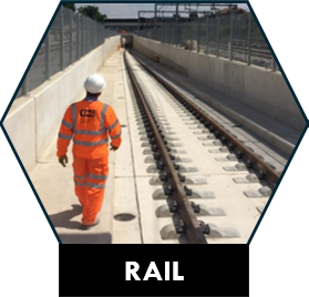Rail: TAG operative walking beside new railway track
